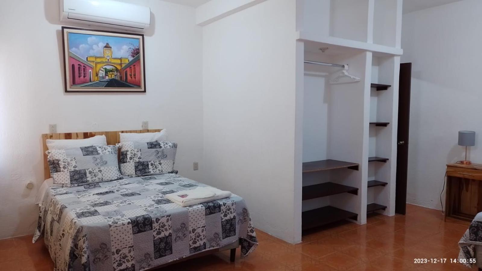 Apartamentos Mundo Maya Habitaciones ฟลอเรส ภายนอก รูปภาพ