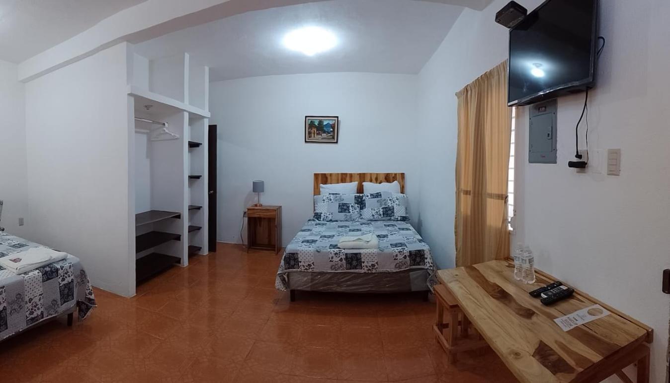 Apartamentos Mundo Maya Habitaciones ฟลอเรส ภายนอก รูปภาพ