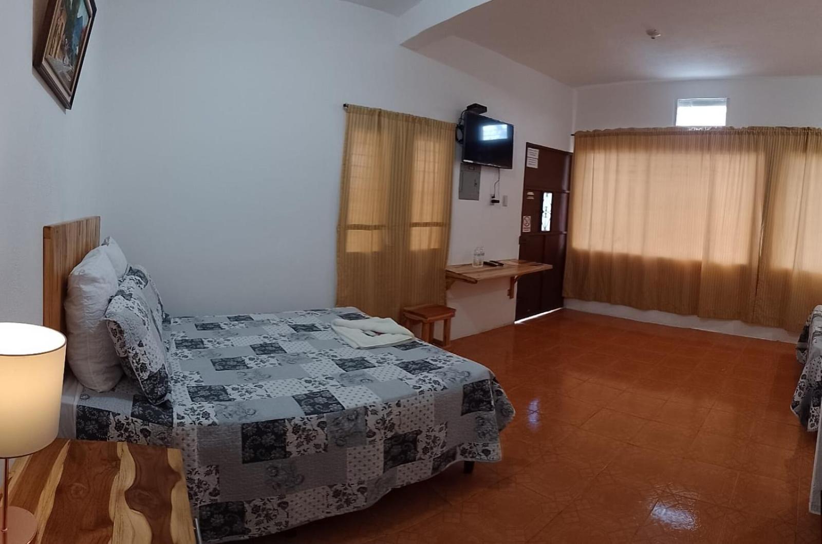 Apartamentos Mundo Maya Habitaciones ฟลอเรส ภายนอก รูปภาพ